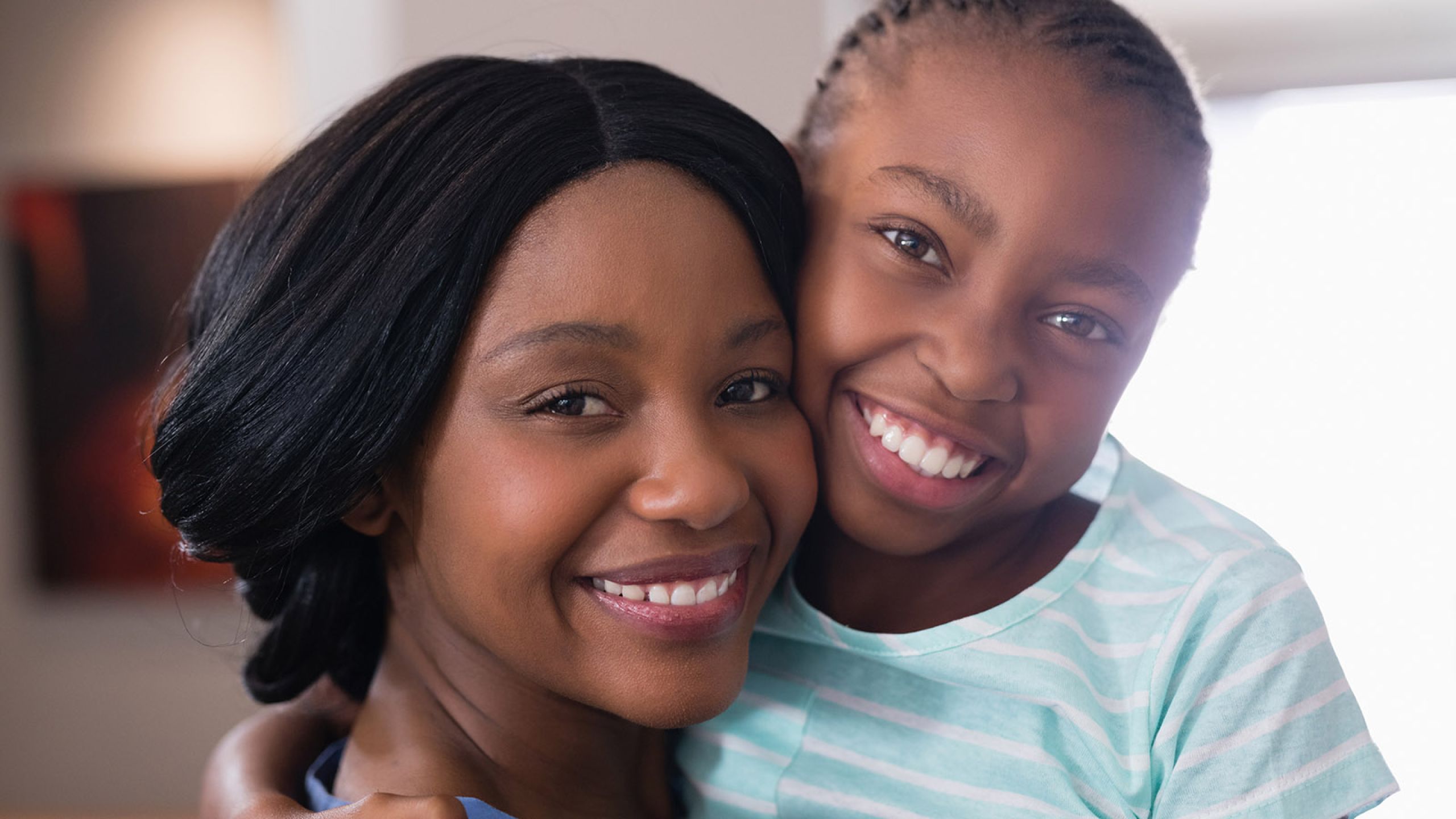 Woman and her child smiling